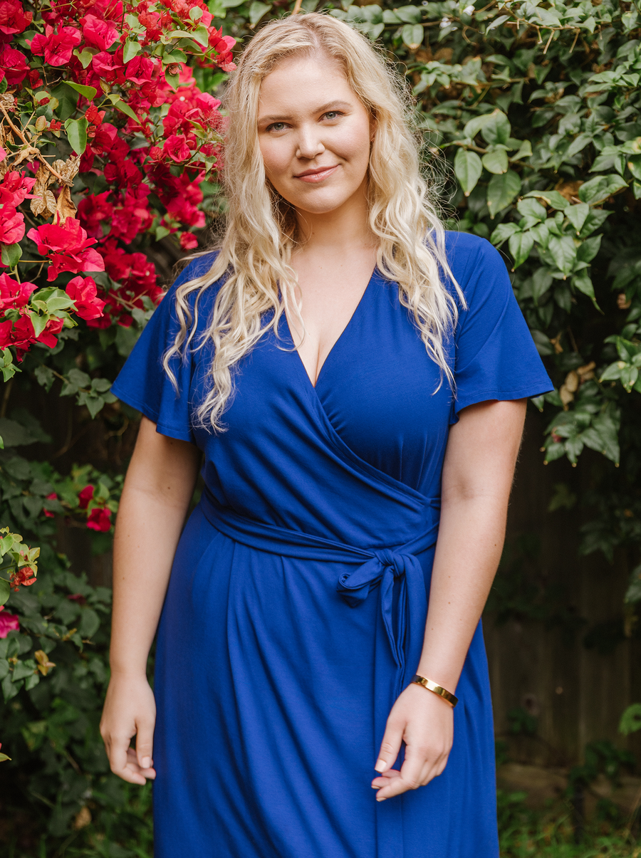 contemporary plus size blue wrap dress with pockets