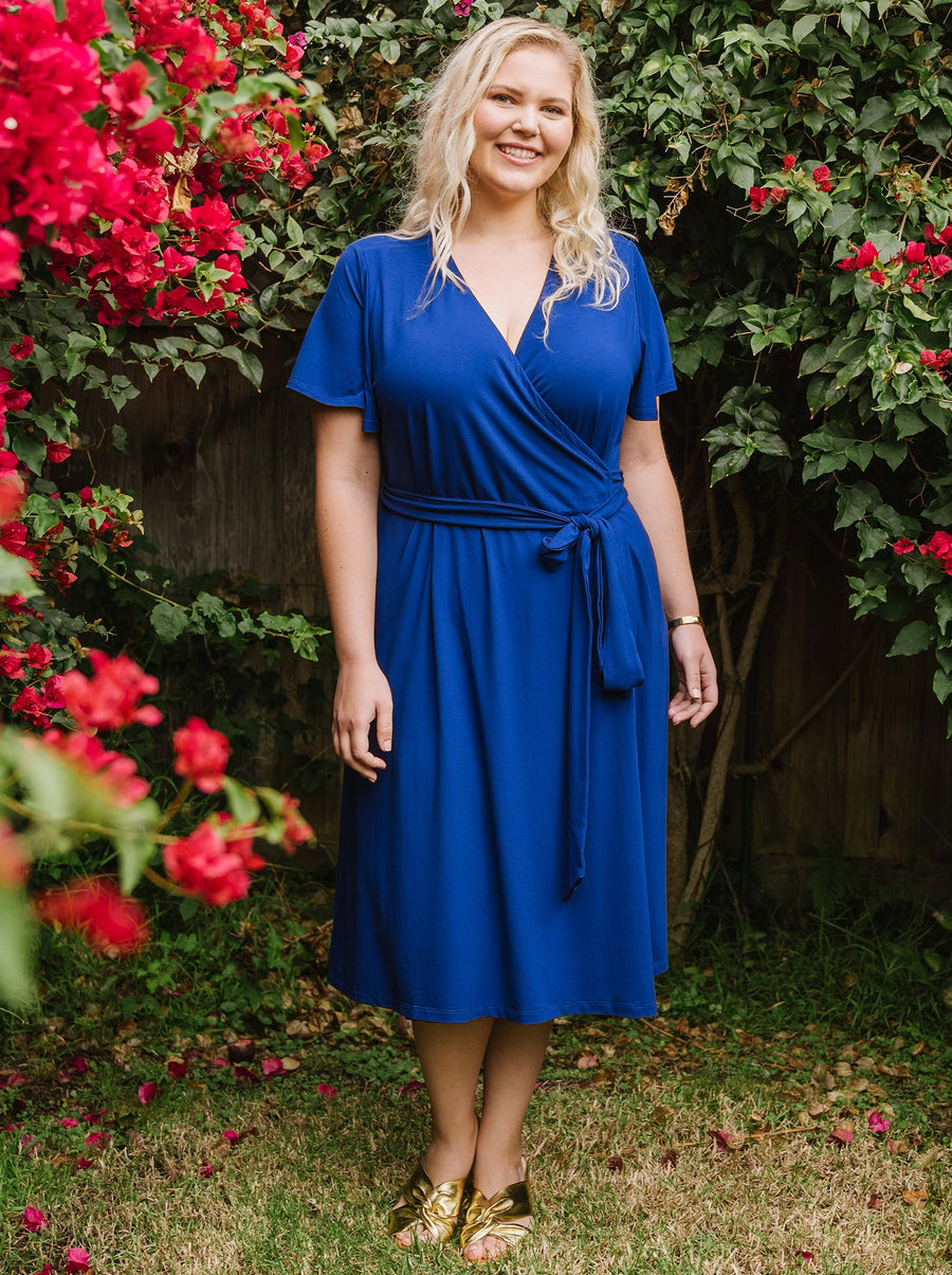 designer plus size blue wrap dress with pockets