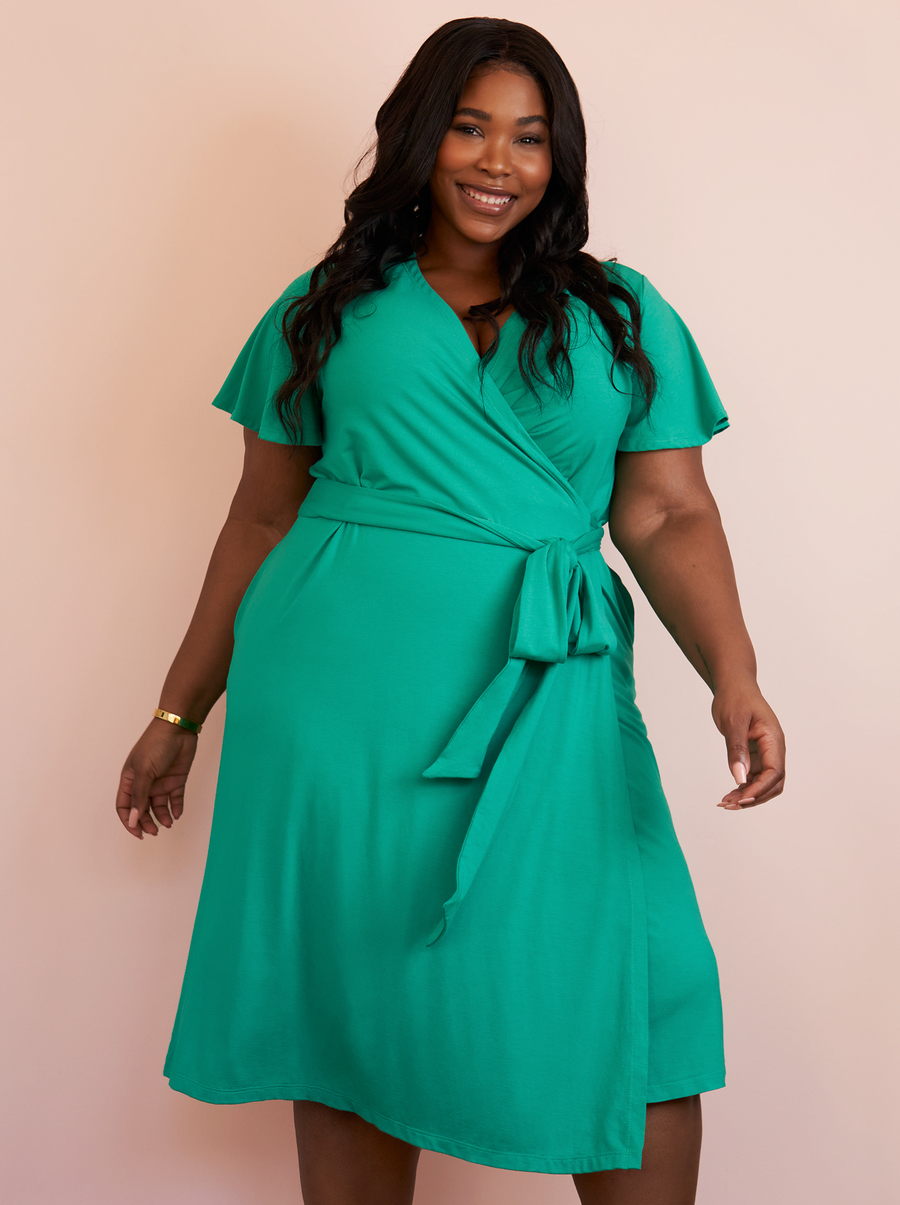 contemporary plus size green wrap dress with pockets front