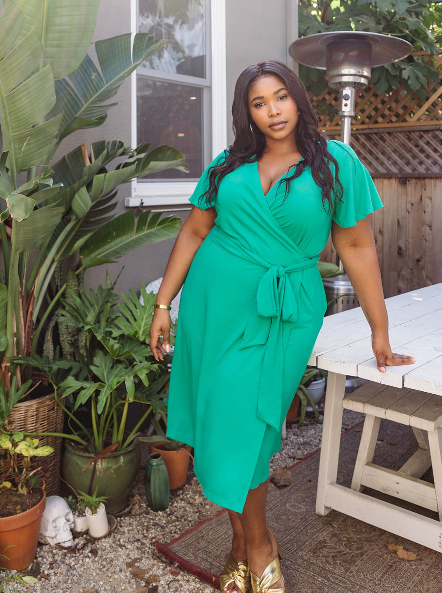 contemporary plus size green wrap dress with pockets